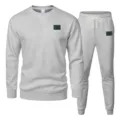 Casual grey tracksuit set for autumn and winter, featuring a crewneck sweatshirt and matching sweatpants. - S / Light Gray