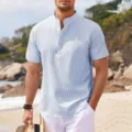 Men's short sleeve stand collar casual shirt with textured seersucker fabric design. - Blue