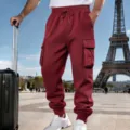 Men's fleece lined burgundy cargo sweatpants detail view, casual outdoor travel style outfit. - S / Burgundy