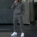 Men's grey tracksuit set featuring a lace-up hoodie and multi-pocket cargo sweatpants. - Gray