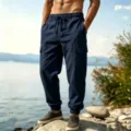 Men casual cotton linen cargo pants detail shot showing multi-pockets and cuffed hem. - S / Bottoms / Navy Blue
