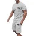Detailed showcase of men casual summer short sleeve t-shirt and shorts set with tropical print. - S / Light Gray