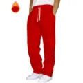 Casual red sweatpants for men and women, loose fit joggers with white drawstring details. - Bright Red