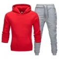 Men's casual tracksuit set featuring a red hooded sweatshirt and grey drawstring sweatpants. - Red Top & Light Gray Pants