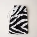 Detail view of men's athletic zebra print mesh shorts with white drawstring for casual wear. - S / Zebra Print Pattern