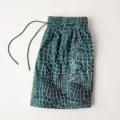 Detailed view of men's athletic mesh shorts with green digital crocodile print and drawstring. - S / Plain Green