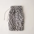 Detailed view of men mesh athletic shorts with trendy print design for fitness and sports training. - S / Tree Branch Pattern