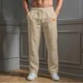 Casual loose men trousers detail, featuring comfortable drawstring waist and practical pockets. - S / Bottoms / Khaki