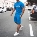 Men's summer casual short sleeve t-shirt and shorts set in vibrant blue with city print. - Light Blue