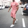 Men's casual pink short sleeve t-shirt and shorts sportswear set detail view and design. - Pink