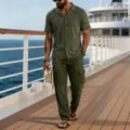 Detailed view of men's casual green linen short sleeve shirt and long pants set for summer. - Army Green