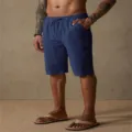 Detailed view of men's casual cotton linen shorts with drawstring waist and deep blue solid color. - Navy Blue