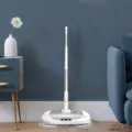 Cordless electric mop with dual spinning pads and water spray function for easy floor cleaning. - White