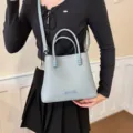 Stylish light blue bucket handbag for women, cute textured tote bag with bead handles. - Blue