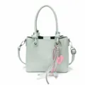 Chic woven leather bucket bag for women, stylish commuter shoulder and chic crossbody bag style. - Blue