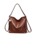 Bolso tote informal vintage de cuero sintético marrón con correas de mochila y colgante. - Bolsa Individual / Marrón