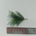 Single cluster of artificial green pine needles for Christmas decor with ruler measurement - Length 7cm Diameter 5cm