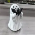 Adorable white resin ghost figurine holding a black bat for Halloween home decor - Bat Ghost 6x6x8cm