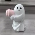 Adorable white ghost resin figurine holding a small pink pumpkin Halloween desk ornament - Pumpkin Ghost 6x6x8cm