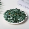 Polished natural green aventurine crystal stones displayed on a white decorative ceramic plate - Green Aventurine / 9-12mm (100g)
