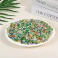 Mixed natural decorative crystal crushed stones displayed on a white plate for aromatherapy - Cat's Eye Stone (5-7mm) / 100g Pack / Colorful