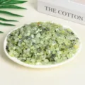 Polished natural green aventurine crystal chips on a white plate for home decor - Prehnite / 7-9mm (100g)