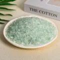 Premium natural tumbled green fluorite crystal crushed stones on a ceramic plate - Green Fluorite / 3-5mm (100g)