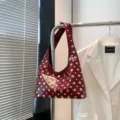 Red shoulder bag for women, trendy hobo underarm bag featuring chic silver round studs design. - Red