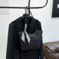 Large capacity black tote bag for women, stylish minimalist shoulder bag for autumn commute. - Black