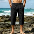 Herren schwarze kurze Freizeithose mit Kordelzug am Bund und feinen Falten am Saum. - S / Schwarz