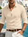 Close-up detail of men's casual long sleeve linen henley shirt in solid beige color. - M / Tops / Apricot