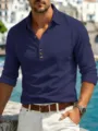 Close-up detail shot of men's casual long-sleeve linen shirt in dark blue with scenic view. - Navy Blue