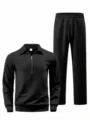Detailansicht des eleganten schwarzen Jacquard Polo Sweatshirts und der Hose. - S / Oberteil und Unterteil / Schwarz