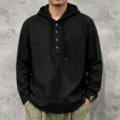 Detail view of men's casual long sleeve linen hoodie with button collar in classic black color. - S / Tops / Black