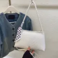 Chic white woven shoulder bag for women, stylish underarm bag with braided strap and scarf. - Off White