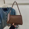Brown woven shoulder bag for women, stylish underarm hobo bag with chic polka dot scarf. - Brown
