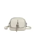 Minimalist off-white crossbody bag with metal tassel and cute bear pendant for daily commute. - White