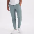 Men's slim fit casual jogger pants detail view, lightweight stretch fabric for daily comfort. - XS / Bottoms / Teal