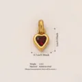 Detailed view of gold plated heart pendant with red gemstone and stainless steel specs - January Birthstone / Pendant Only (No Chain) / Gold/Red