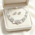 Detailed view of elegant bridal crystal necklace and earrings set in jewelry box - Clear Crystal Necklace Stud Earring Set / White (YZ001)