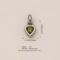 Heart-shaped stainless steel pendant with green faceted gemstone and size specifications - August Birthstone / Pendant Only (No Chain) / Silver/Green