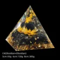 Natural black obsidian crystal pyramid ornament with gold lotus leaf and foil accents. - 5cm Size / C4 Obsidian + Lotus + Obsidian