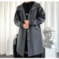 Close-up detail of the stylish men's dark grey hooded long trench coat with snap buttons. - S / Tops / Gray