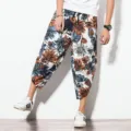 Detail view of men casual floral linen cropped pants, loose fit ethnic style summer trousers. - Color 9 (Blue & Orange Floral)