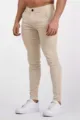 Men's casual slim trousers in khaki stretch fabric, close-up view showing fit and details. - S / Apricot