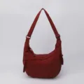 Casual nylon crescent shoulder bag for women, lightweight solid color crossbody dumpling bag. - Red