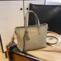 Green woven tote bag with shoulder strap, large capacity commuter handbag for women. - Green
