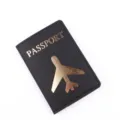 Copertina per passaporto in pelle PU nera con design aereo dorato, organizer documenti elegante. - Nero