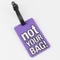 Purple PVC luggage tag with bold white lettering, durable travel bag ID label for gifts. - Purple