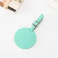 Mint green round PU leather luggage tag with cute debossed smiley face design and metal buckle. - 8.5cm / Light Green